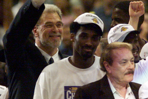 Phil Jackson, Kobe Bryant and Jerry Buss celebrate the Lakers' win in Game 6 of the NBA Finals at Staples Center in 2000.