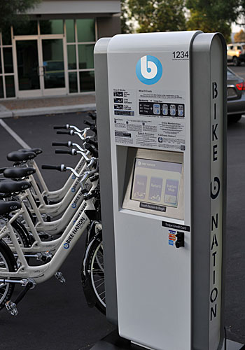 Bicycles will be available to borrow or rent at hundreds of kiosks similar to this one.