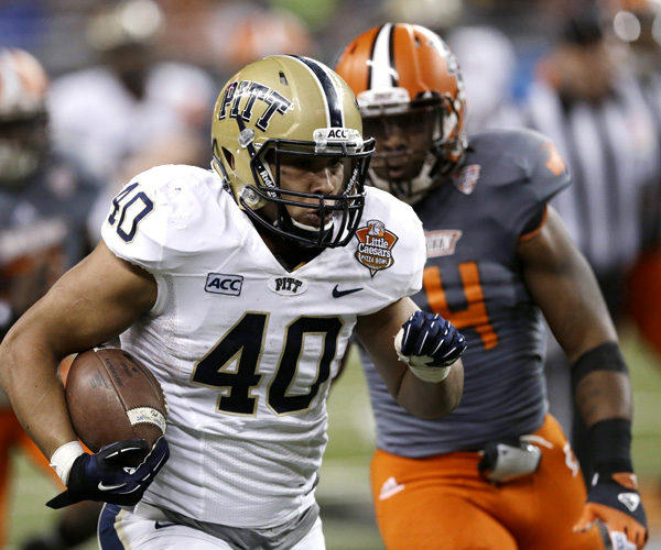Pittsburgh running back James Conner, who rushed for 229 yards, breaks into the Bowling Green secondary on a run in the second half. Pitt won the game, 30-27.