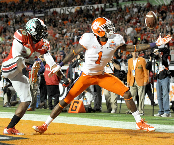 Clemson receiver Martavis Bryant makes a juggling touchdown catch against Ohio State cornerback Armani Reeves to put the Tiger ahead in the third quarter of the Orange Bowl. Clemson's Tajh Boyd threw for 378 yards and five touchdowns while Sammy Watkins had a record-setting night with 16 catches for 227 yards and two touchdowns.