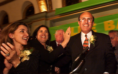 Lee Baca is congratulated by his sister Elaine Baca Wagner, center, and supporter, Nadia Nalbandian, left, as he prepares to make his victory speach at the Ritz Calton in Pasadena. (Nov. 3, 1998)