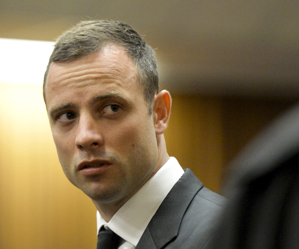 Pistorius stands in court on the first day of his trial.