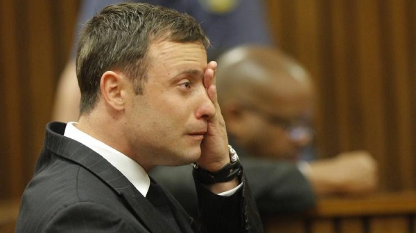 Oscar Pistorius reacts during the reading of the verdict in his murder trial in Pretoria, South Africa, on Sept. 11.