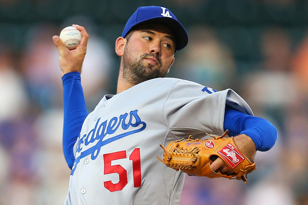 Dodgers starter Zach Lee delivers a pitch during the first inning of a 15-2 loss to the New York Mets.
