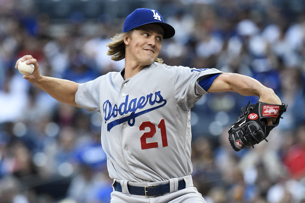 Dodgers starter Zack Greinke delivers a pitch during the first inning of a loss to the San Diego Padres.