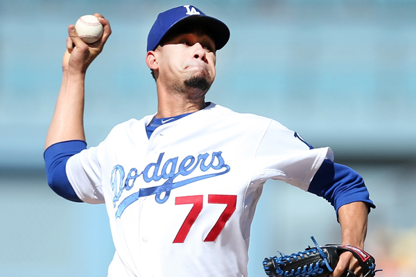 Dodgers starter Carlos Frias delivers a pitch during a 6-2 loss to the San Francisco Giants at Dodger Stadium.