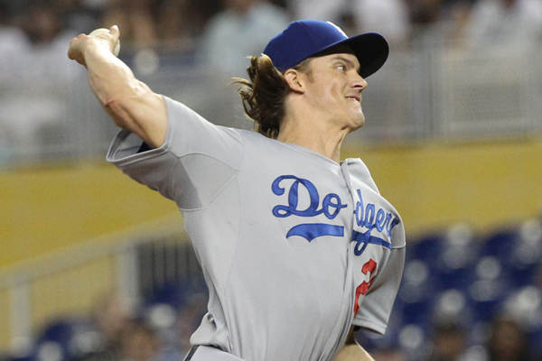 Dodgers starter Zack Greinke delivers a pitch during the first inning of a 2-0 victory over the Miami Marlins.