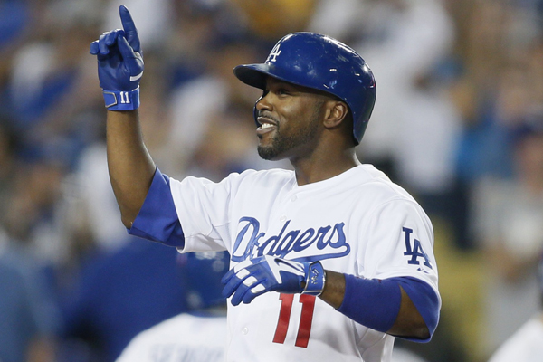 Dodgers shortstop Jimmy Rollins celebrates after hitting a three-run home run during the fourth inning of a win over the Arizona Diamondbacks.