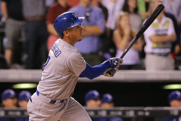 Dodgers left fielder Alex Guerrero hits a ninth-inning grand slam during a win over the Colorado Rockies in the second game of a doubleheader.
