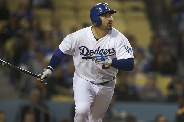 Dodgers first baseman Adrian Gonzalez singles during the seventh inning of a win over the Mariners.