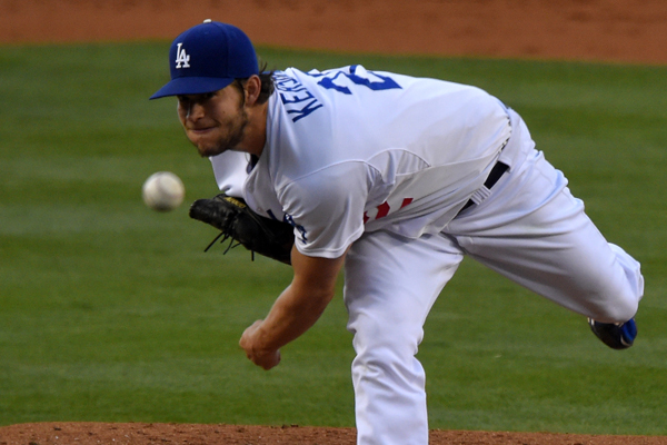 Dodgers starter Clayton Kershaw delivers a pitch during the first inning of the loss to the Texas Rangers.