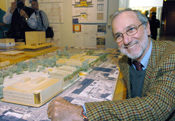 Architect Renzo Piano poses with a scale model of the redesigned LACMA campus.