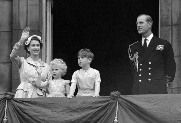 Prince Charles and Princess Anne with their parents, Queen Elizabeth II and the Duke of Edinburgh, on the balcony of Buckingham Palace on May 15, 1954.