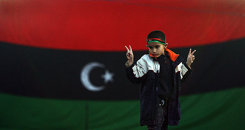 A boy celebrates the rebel victory in Ajdabiya.