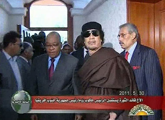 South African President Jacob Zuma, left, with Moammar Kadafi in Tripoli.