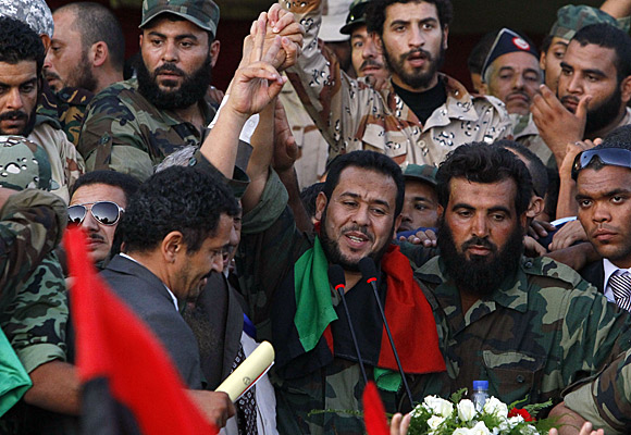 Abdel-Hakim Belhaj, center, a leader of the anti-Kadafi military forces.