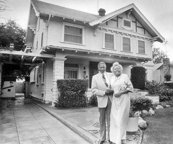James and Carolyn Shifflett, in front of their home in Sugar Hill/West Adams. The Shiffletts were the first black couple to move to the area in 1947.
