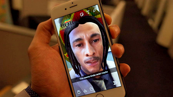 Snapchat faces criticism for a sponsored lens that turns users into Bob Marley.