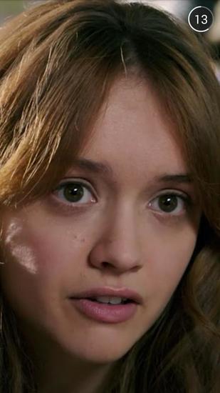 Actress Olivia Cooke is seen a trailer for the movie "Ouija" that users on Snapchat had a chance to voluntarily watch. 