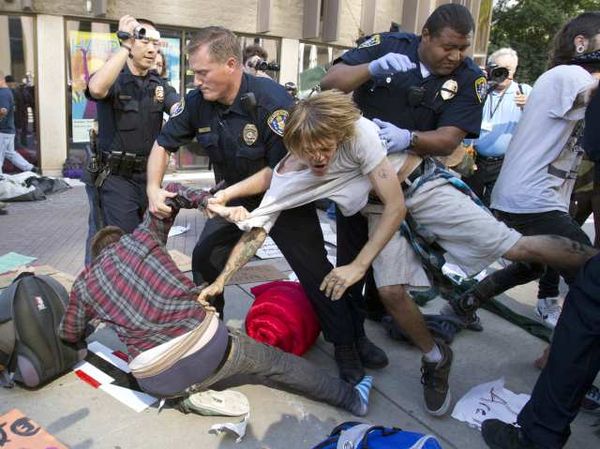 Police tussle with Occupy San Diego protesters. 