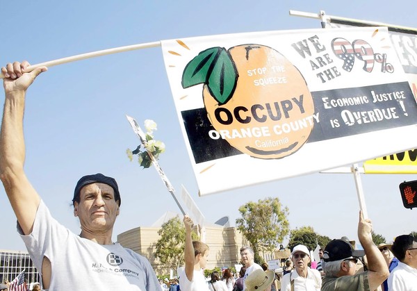 Alex Sircello of Orange County with other protesters outside Irvine City Hall. (Oct. 15, 2011)