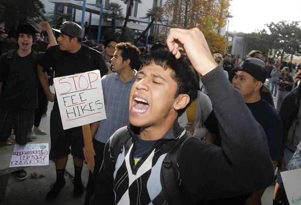 Cal State Fullerton sophomore Claudio Soria leads fellow students in a protest of tuition hikes. (Nov. 15, 2011)
