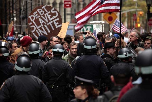 Hundreds of Occupy Wall Street protesters marched through the financial district trying to shut off access to the New York Stock Exchange and major banks.