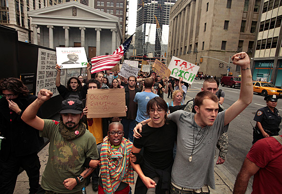 Day 13: Occupy Wall Street begins the morning with a march around the time the opening bell rings at the stock exchange.