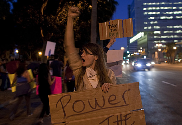 Shayne Eastin, 27, of Los Angeles protests on the second day of Occupy L.A.