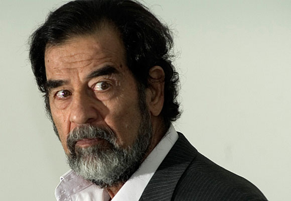 Former Iraqi President Saddam Hussein, seen           here last year, was convicted today of charges connected to the deaths of Shiite Muslim villagers.