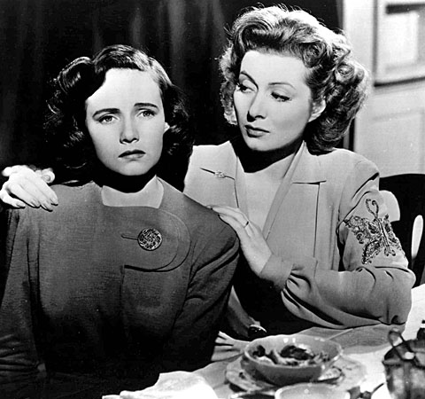 Teresa Wright, left, and Greer Garson in a scene from "Mrs. Miniver." 