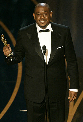 Forest Whitaker accepts his Oscar for lead actor for his performance as Idi Amin in "The Last King Of Scotland."