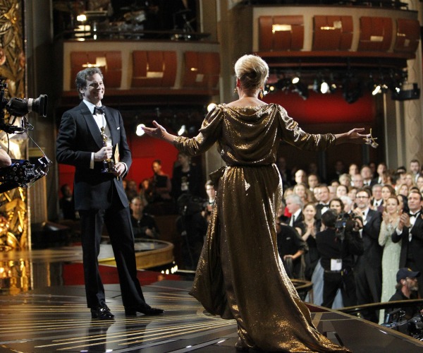 Colin Firth presents Meryl Streep with her first Oscar since 1983.