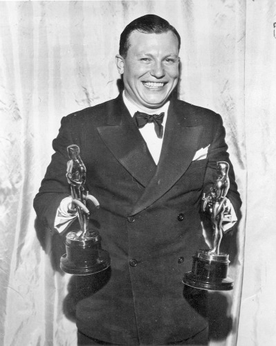 Harold Russell holds his two Oscars.