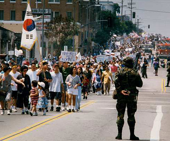 A peace march down 3rd Street.  (May 2, 1992)