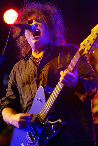 Robert Smith of the Cure sings at Coachella on May 2, 2004.