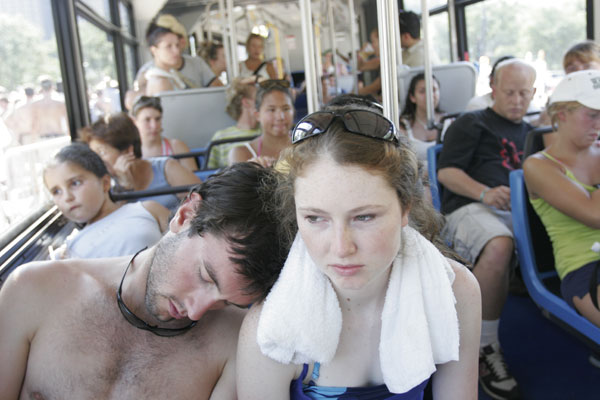 Fans cool off in a bus at Lollapalooza in Chicago.