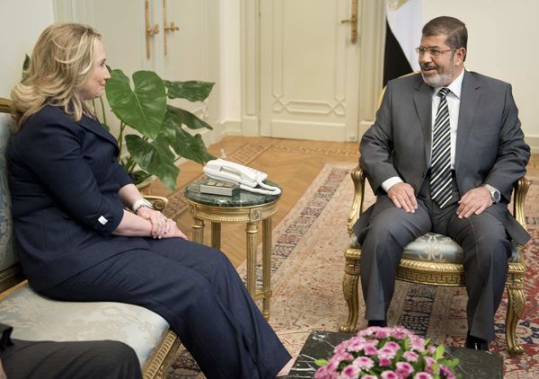U.S. Secretary of State Hillary Clinton meets with Egyptian President Mohammed Morsi at the presidential palace in Cairo on July 14, 2012.