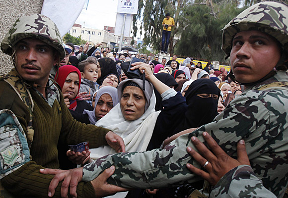 Egyptians wait to cast ballots in Alexandria.