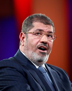 Egyptian President Mohamed Morsi, shown speaking last month at the Clinton Global Initiative in New York, has offered a blanket pardon of hundreds of activists arrested during last year’s revolution and its aftermath.