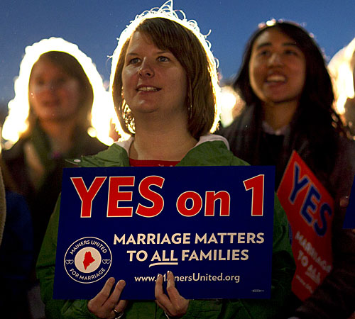 Ashley Gorczyga, of Portland, attends a rally in support for gay marriage in downtown Portland, Maine.