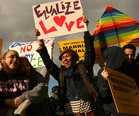 Supporters of same-sex marriage wait for the ruling, which left key details to the Legislature.