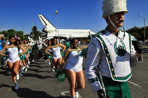 The Inglewood High School band marches to send-off space shuttle Endeavour from the Inglewood Forum on Saturday.