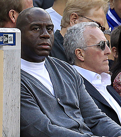 Magic Johnson with Frank McCourt at the Dodgers' opener in San Diego.