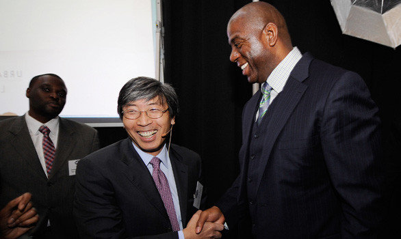 Patrick Soon-Shiong and former Lakers great Magic Johnson are part of two separate groups that are bidding for the Dodgers.