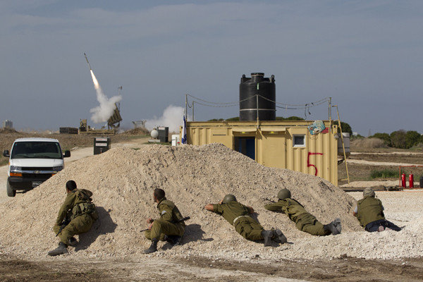 A missile is launched from a battery that's part of the Iron Dome system to intercept a rocket fired by Palestinian militants in the Gaza Strip.