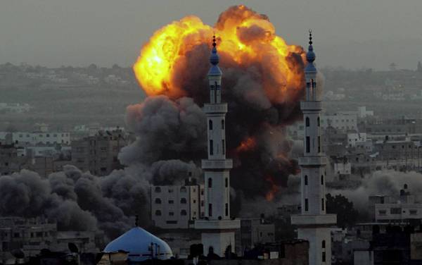 Smoke rises after an airstrike southeast of Gaza City that Israel says was aimed at a Hamas site. 