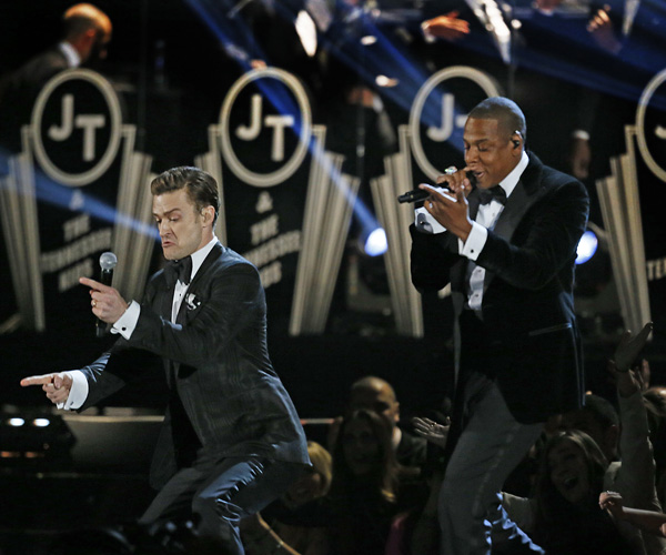 Justin Timberlake, left, performs his song "Suit and Tie," featuring rapper Jay-Z at the 55th Grammy Awards.