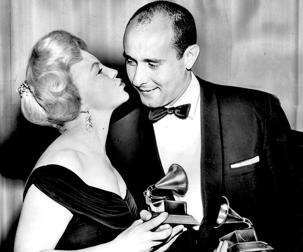 Peggy Lee presents the Grammy for album of the year to Henry Mancini for "Peter Gunn," which also wins for best arrangement.