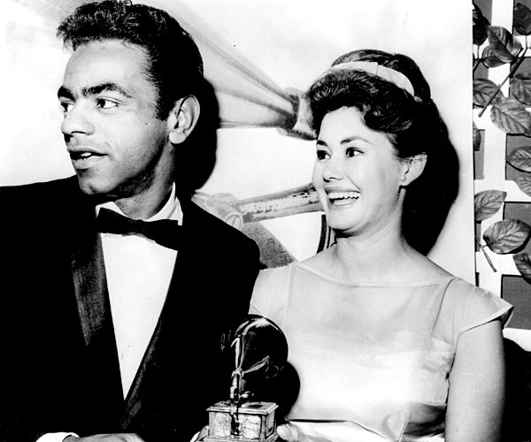 Singers Johnny Mathis and Roberta Shore, photographed at a dinner for the Grammy Awards in 1965.
